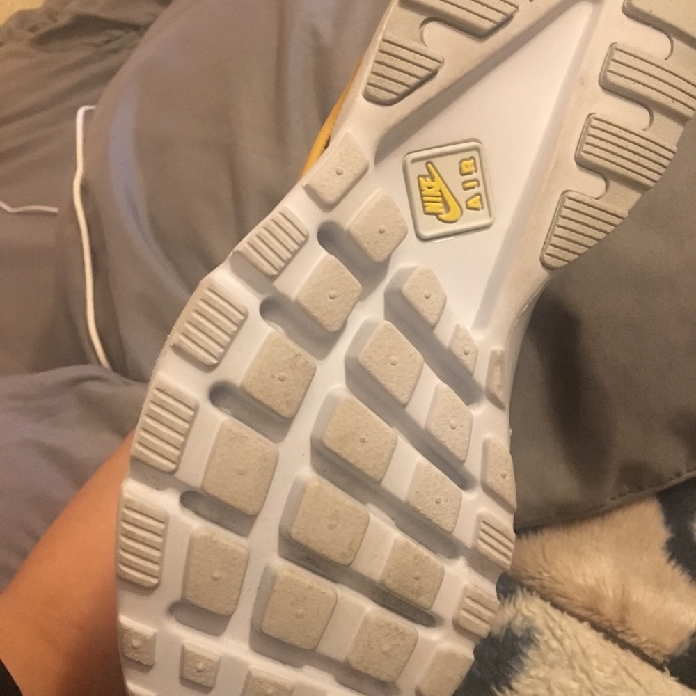 Mustard yellow huraches.